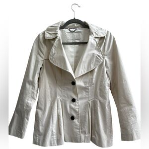 Banana Republic trench coat in cream. Single-breasted